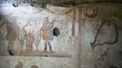 A fresco is seen inside the kitchen of a house at the Pompeii archaeological site in southern Italy, Tuesday, Feb. 15, 2022. In a few horrible hours, Pompeii went from being a vibrant city to a dead one, smothered by a furious volcanic eruption in 79 AD. Then in this century, Pompeii appeared alarmingly on the precipice of a second death, assailed by decades of neglect, mismanagement and scanty systematic maintenance of heavily visited ruins. (AP Photo / Gregorio Borgia)