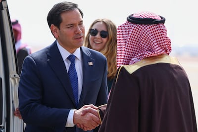 US Secretary of State Marco Rubio is received by Saudi Deputy Minister for Protocol Affairs Abdulmajeed Al Smari at King Khalid International Airport in Riyadh. AFP