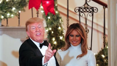 US President Donald Trump and First Lady Melania Trump greet guests at the Congressional Ball on December 15, 2018. AFP