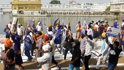 Activists from various Sikh organisations after offering prayers at the Golden Temple on the 38th anniversary of Operation Blue Star on June 6, 2022. AFP