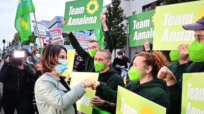 Green party supporters greet co-leader Annalena Baerbock in Berlin. AFP