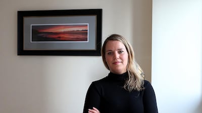 Like many millennials, Dubai resident Rhiannon Davies prefers to manage her investments herself. Satish Kumar / The National