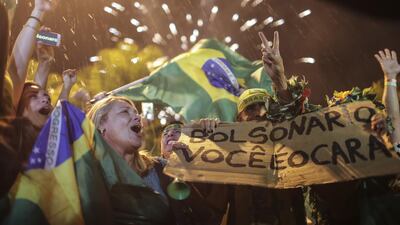 Supporters of Brazilian far-right presidential candidate Jair Bolsonaro celebrate in Rio de Janeiro. EPA