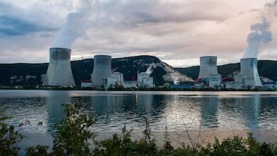 Cooling towers on the banks of the River Rhone at France's Cruas nuclear power plant. Bloomberg