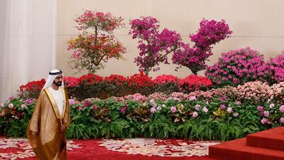 Sheikh Mohammed bin Rashid arrives for a welcoming banquet. EPA