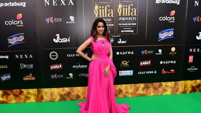 Asees Kaur wearing a pink gown. AFP