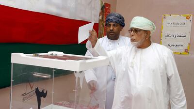 An Omani man casts his ballot at a polling station in Muscat for the shura council on October 25. AFP Photo
