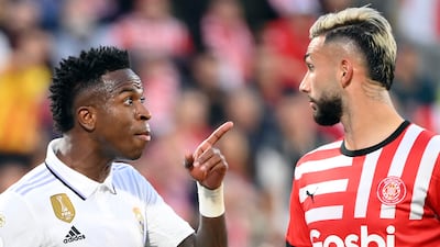 Real Madrid's Vinicius Junior remonstrates with Girona's Taty Castellanos during the La Liga match at the Montilivi stadium in Girona on April 25, 2023. Girona won the match 4-2, with Castellanos bagging all four Girona goals. AFP