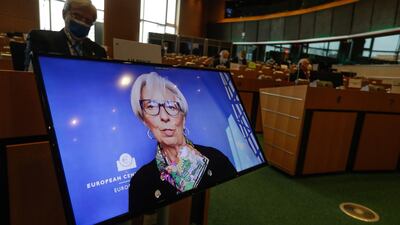 Christine Lagarde, President of the European Central Bank, shown on screen during a Committee on Economic and Monetary Affairs at the European Parliament in Brussels, Belgium. Ms Lagarde said the economic situation 'looks much brighter' than it did a year ago but the outlook remains uncertain. EPA