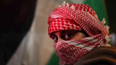 A protester outside in Birmingham, England, before the Europa League match between Aston Villa and Israeli side Maccabi Tel Aviv. Reuters