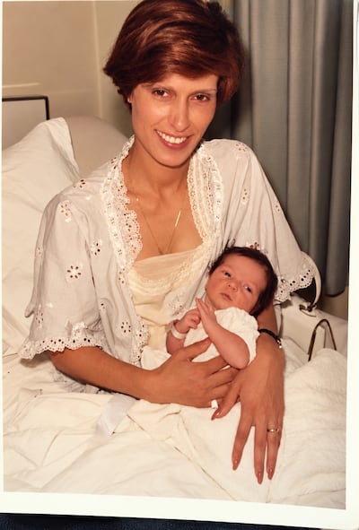 Becky Fatemi as a baby in Iran with her mother.