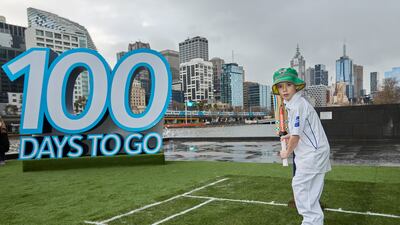 A young cricket fan poses for a photograph. Getty Images