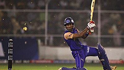 Abhishek Jhunjhunwala unfurls a square drive during his unbeaten half-century for the Rajasthan Royals yesterday.