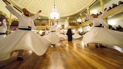 Whirling dervishes perform at a ceremony in Istanbul marking the death of Sufism founder Jelaleddin Mevlana Rumi. AFP
