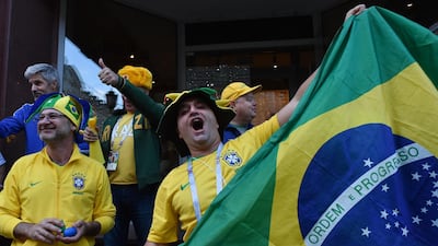 Brazil's national football team fans cheer in central Moscow on June 14. Vasily Maximov / AFP
