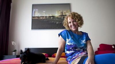 Animal communicator Sabine Poncelet with her pet Chihuahua Petzi.Christopher Pike / The National