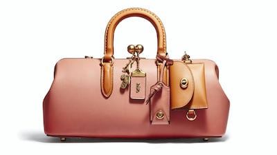 Inject fresh energy into your autumn wardrobe with a blush-pink-toned handbag