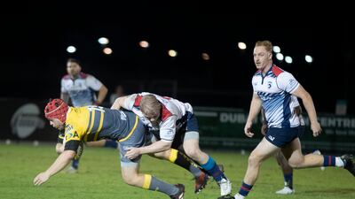Lalaga Jope of Dubai Hurricanes is tackled in the 40-15 defeat to Jebel Ali Dragons at The Sevens Stadium.