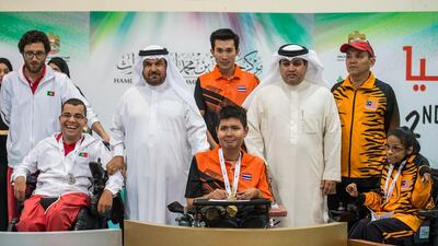 Chao-Warit Sangchinda of Thailand, centre, Roberto Ferreira of Portugal, left, and Sivakangai Sivapragasam of Malaysia, right, awarded their medals for the BC3 discipline at the Fazza International Boccia Competition in Dubai. Photo Courtesy / HHC Media