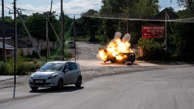 A Russian drone hits a car in Kramatorsk, Ukraine. Reuters