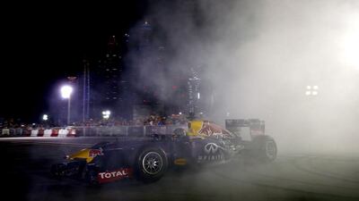 Daniel Ricciardo and Sebastian Vettel drive during an Infiniti Red Bull Racing show run on Wednesday.