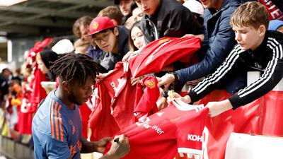 Fred of Manchester United signs autographs. Getty Images