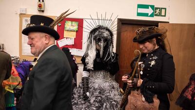 Steampunk enthusiasts peruse the trade stalls in Haworth Village Hall. AFP