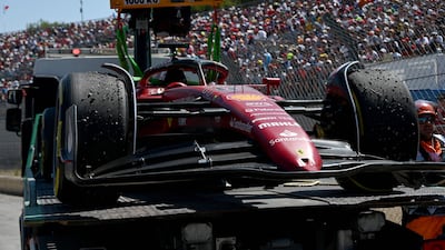 Leclerc's Ferrari is removed. AFP