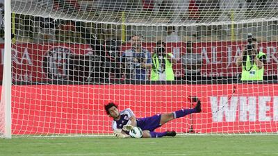Al Ain goalkeeper Dawoud Sulaiman saves a crucial penalty during the shootout. Al Ain would win the game 5-4 on pens. Jaime Puebla / The National
