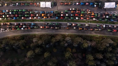 Tractors blockade a motorway outside the Greek city of Larissa, during a farmers' protest to demand swifter access to EU subsidies delayed by a continuing investigation into multi-million fraud. AFP