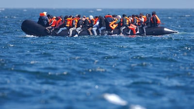An inflatable boat carrying migrants crosses the English Channel after leaving northern France. Getty Images