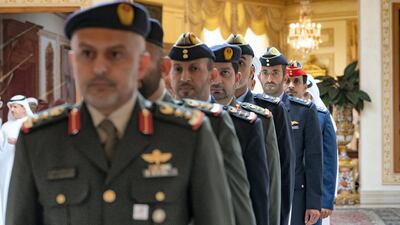 Members of the UAE Armed Forces who received an Emirates Military Medal attend a Sea Palace barza. Seen with Sheikh Mohamed bin Suroor Al Nahyan, third right.