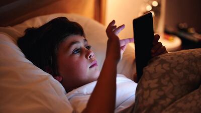 Games such as Minecraft and Dragon City are popular with children who use iPads and mobile technology but can encourage prolonged use of such devices. iStock.com