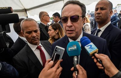Hafedh Caid Essebsi, the Tunisian president's son, speaks to the press outside the Nidaa Tounes party's congress on April 6, 2019. AFP