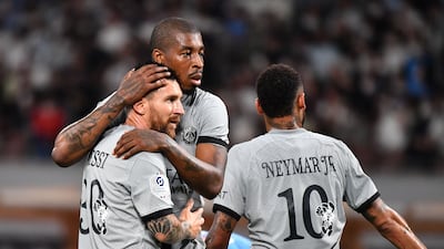 Lionel Messi celebrates his goal with PSG teammates Presnel Kimpembe and Neymar. AFP