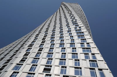 The twisting facade of Cayan Tower as seen from below. Pawan Singh / The National