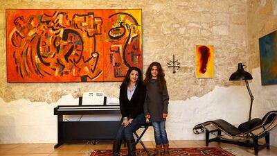 Charlotte Stafarce, 49, and her daughter Scarlett Stafarce, 9, in the living room of their home in Zebbug, outside Valletta. Charlotte is an actress and freelance drama teacher who finished her education at 17. Charlotte hopes her daughter will be a scientist when she grows up. Scarlett says she will finish education when she's about 25 and that she would like to be a veterinarian. Darrin Zammit Lupi / Reuters