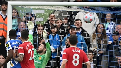 Brighton's defender Marc Cucurella scores past Manchester United's goalkeeper David de Gea. AFP