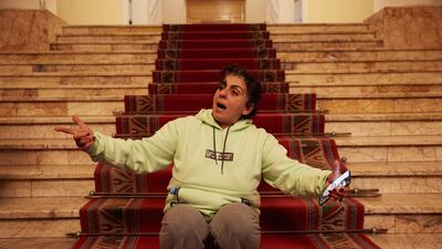 A woman protests on the steps outside Armenian Prime Minister Nikol Pashinian's office after the announcement of a peace deal in the war between Armenia and Azerbaijan in Yerevan. Getty Images