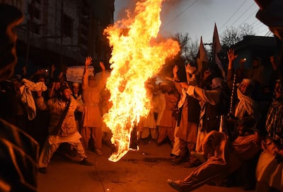 Pakistani demonstrators burn the US flag at a protest in Quetta on January 4, 2018. AFP Photo