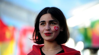 Tunisia soccer fans gather to watch their national team play against France in a World Cup Group D soccer match played in Qatar, on a large screen set up for fans in Tunis, Tunisia. AP Photo