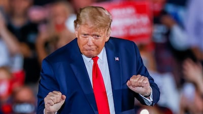 US President Donald J. Trump dances after speaking during his Make America Great Again Rally campaign event at Middle Georgia Regional Airport. EPA