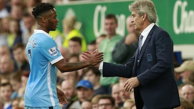 Manchester City manager Manuel Pellegrini greets Raheem Sterling as he is substituted on Sunday during the team's win over Everton in the Premier League. Jason Cairnduff / Action Images / Reuters / August 23, 2015