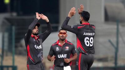 Ahmed Raza, right, was been asked to lead the UAE in a difficult period. Pawan Singh / The National