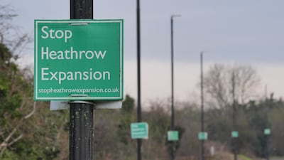 A protest sign on a lamppost near Harmondsworth, one of the villages affected by Heathrow's expansion plans. PA