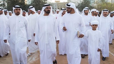 Sheikh Mohammed bin Zayed, Crown Prince of Abu Dhabi, centre, Sheikh Mohammed bin Rashid, Vice President and Ruler of Dubai, left, and Sheikh Zayed bin Mohammed bin Hamed bin Tahnoon Al Nahyan, right, tour the fort during the Qasr Al Hosn Festival. Silvia Razgova / Crown Prince Court - Abu Dhabi