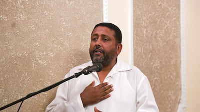 Devendra Mahadeva speaks on behalf of the Hindu community at the remembrance ceremony.