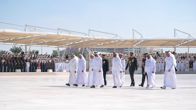UAE Rulers approach the memorial to lay wreaths.