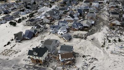 An international team of scientists dug into two dozen locations around the world to chart gently rising and falling seas over centuries and millennia. Mike Groll / AP Photo / Files