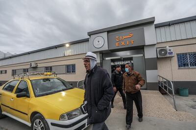 Palestinian workers leave the Hamas-controlled side of the Erez crossing from Gaza into Israel. EPA